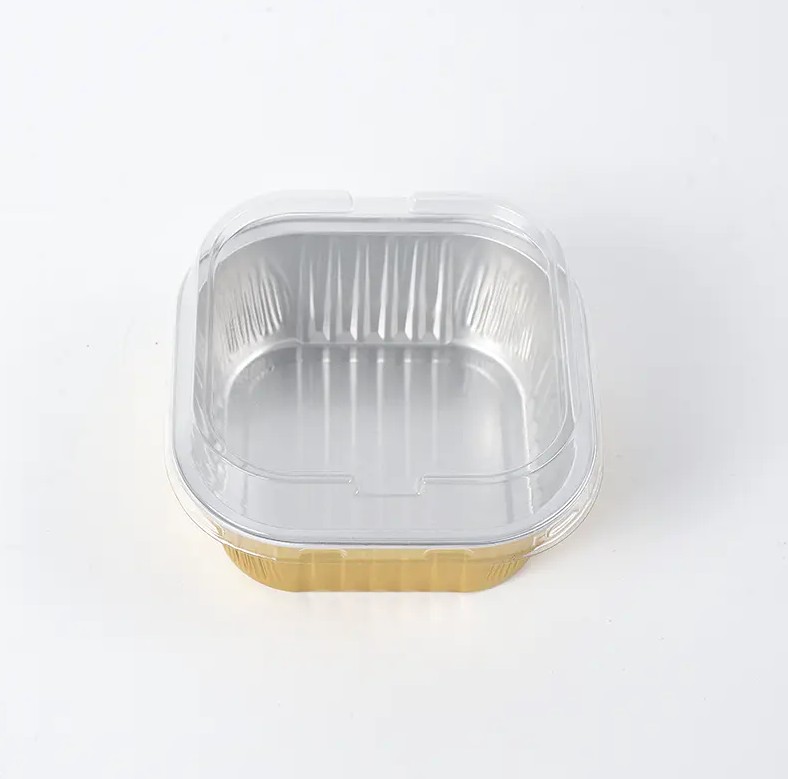 Como o design à prova de rugas do recipiente quadrado para alimentos de folha de alumínio sem rugas é realizado durante o processo de produção e que impacto isso tem no uso do recipiente?